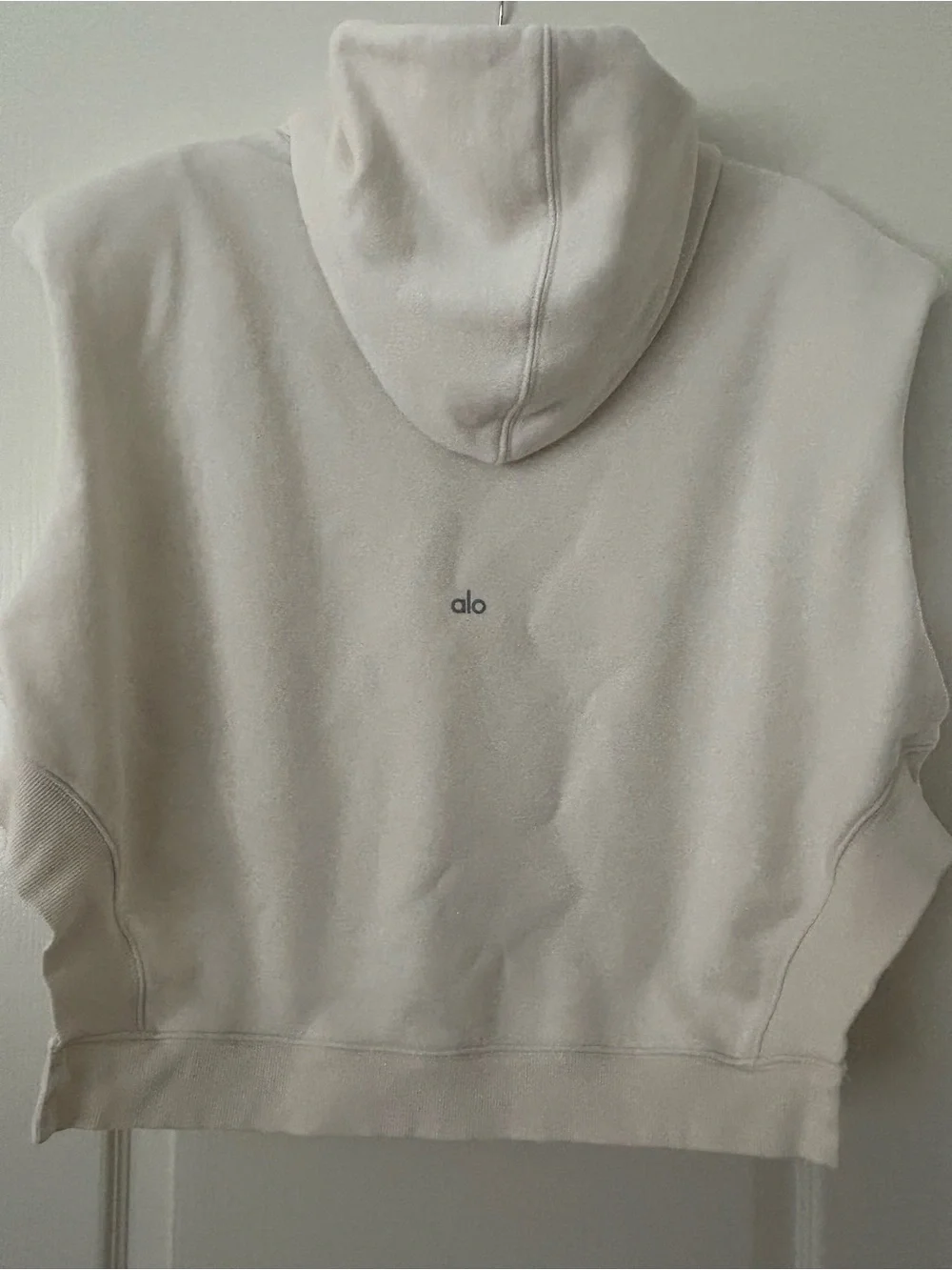 ALO Yoga Sleeveless Hooded Pullover in Light Cream